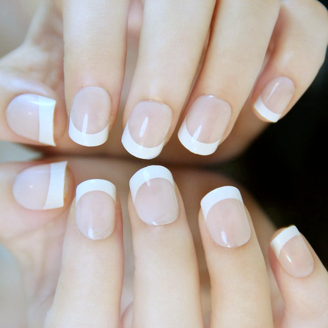 Premium Photo | Woman demonstrates a fresh manicure